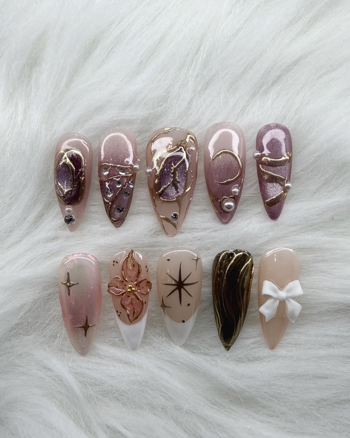 Sahara Nails — luxury mauve and gold nail art
