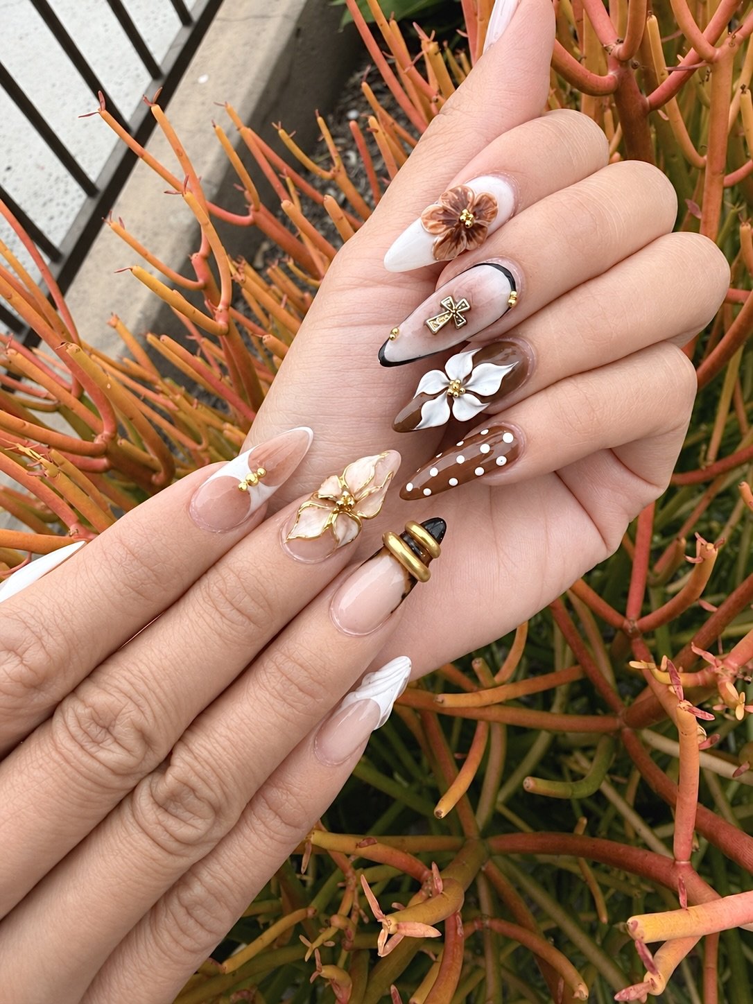 Brown and white floral nail art